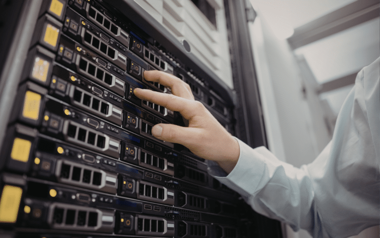 Technician working on rack-mounted server hardware