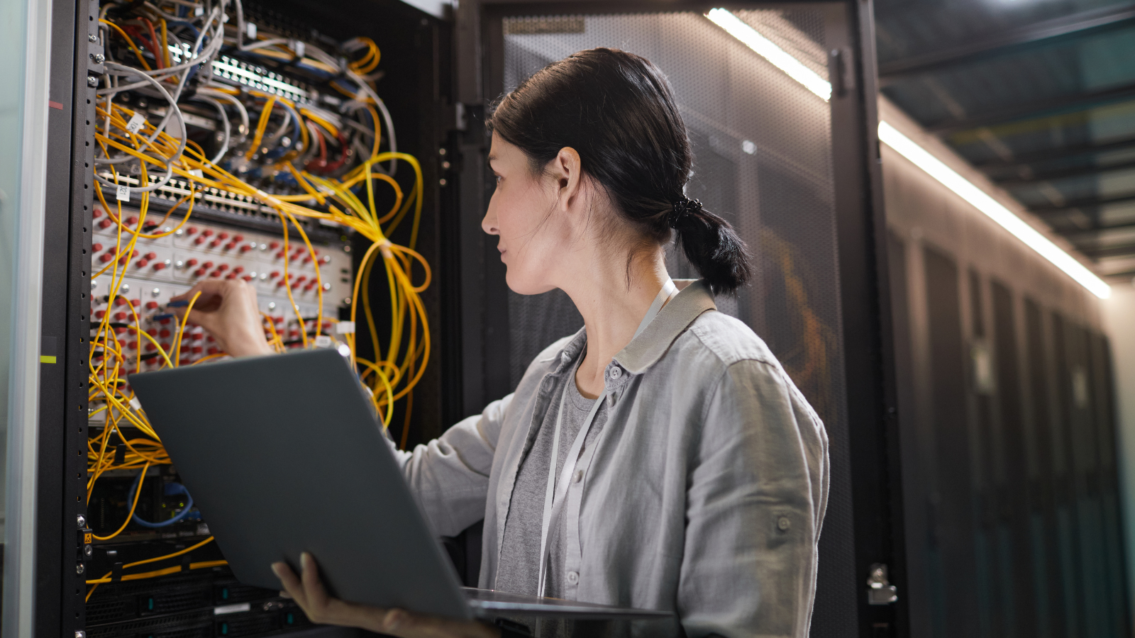 Network engineer validating a standardized technology deployment configuration for multiple business locations