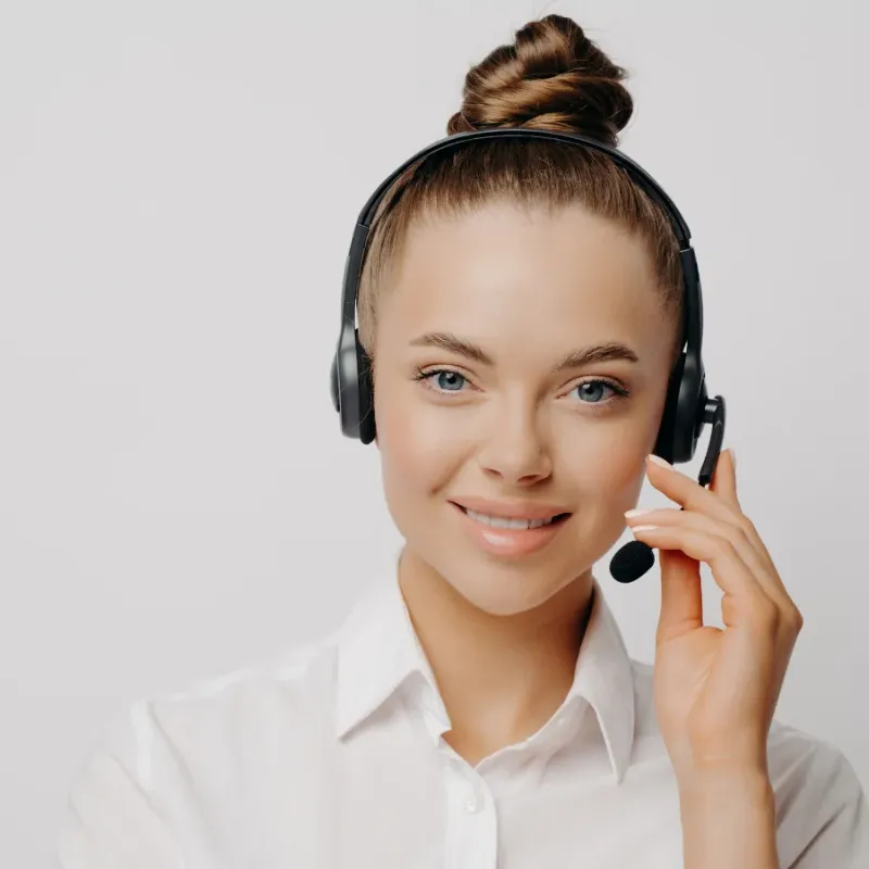 Support specialist in a headset answering questions about IT support for CPA firms