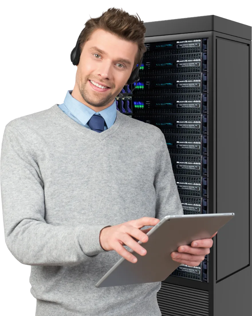 HTG technician reviewing compliance evidence on a tablet beside a server rack