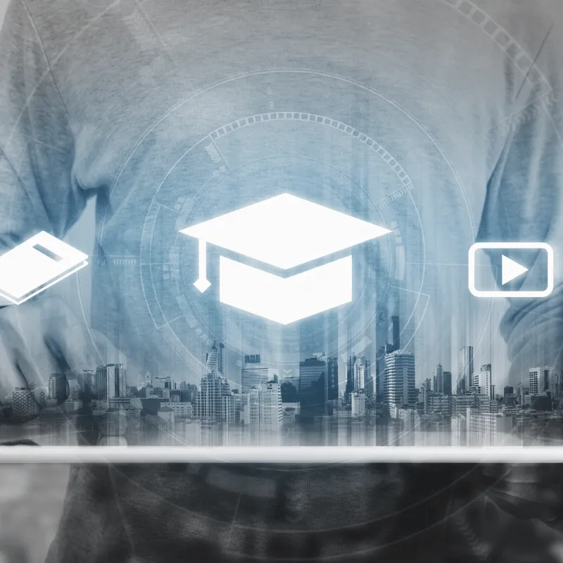 Graduation cap and learning icons above a tablet, representing education IT services
